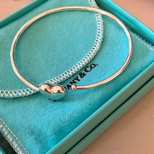 Authentic Tiffany & Co. puff heart bracelet Sterling Silver open clasp.
